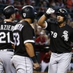 Chicago White Sox's Jose Abreu (79) celebrates his two-run home run against the Arizona Diamondbacks with Todd Frazier (21) and Melky Cabrera (53) during the sixth inning of a baseball game, Wednesday, May 24, 2017, in Phoenix. (AP Photo/Ross D. Franklin)