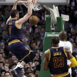 Cleveland Cavaliers forward Kevin Love follows through on a slam-dunk against the Boston Celtics during the first half of Game 2 of the NBA basketball Eastern Conference finals, Friday, May 19, 2017, in Boston. (AP Photo/Elise Amendola)