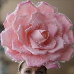 A woman wears a fancy hat before the 143rd running of the Kentucky Derby horse race at Churchill Downs Saturday, May 6, 2017, in Louisville, Ky. (AP Photo/John Minchillo)