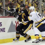 Nashville Predators' Cody McLeod, right, checks Pittsburgh Penguins' Evgeni Malkin during the second period in Game 1 of the NHL hockey Stanley Cup Finals, Monday, May 29, 2017, in Pittsburgh. (AP Photo/Keith Srakocic)