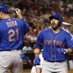 New York Mets' Rene Rivera, right, celebrates his two-run home run against the Arizona Diamondbacks with Lucas Duda (21) during the seventh inning of a baseball game Tuesday, May 16, 2017, in Phoenix. (AP Photo/Ross D. Franklin)