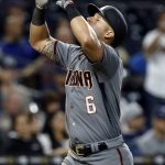 Arizona Diamondbacks' David Peralta raises his hands to the sky after hitting a solo home run against the San Diego Padres during the sixth inning of a baseball game in San Diego, Friday, May 19, 2017. (AP Photo/Alex Gallardo)