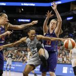 San Antonio Stars' Monique Currie grabs for the ball between Phoenix Mercury's Brittney Griner, left, and Cayla George during second-half WNBA basketball game action Friday, May 19, 2017, in San Antonio. (Edward A. Ornelas/The San Antonio Express-News via AP)