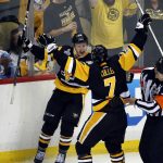 Pittsburgh Penguins' Jake Guentzel, rear, celebrates his goal against the Nashville Predators with Matt Cullen during the third period in Game 1 of the NHL hockey Stanley Cup Finals, Monday, May 29, 2017, in Pittsburgh. (AP Photo/Gene J. Puskar)