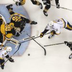 Pittsburgh Penguins goalie Matt Murray (30) stops a shot and Nashville Predators' Austin Watson (51) cannot get to the rebound during the first period of Game 1 of the Stanley Cup Final, Monday, May 29, 2017, in Pittsburgh. (AP Photo/Gene J. Puskar){