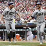 Tampa Bay Rays' Kevin Kiermaier, right, and Peter Bourjos celebrate after Kiemaier's scored on a sacrifice fly by Derek Norris off Minnesota Twins pitcher Adalberto Mejia in the fourth inning of a baseball game Saturday, May 27, 2017, in Minneapolis. AP Photo/Jim Mone)
