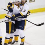Nashville Predators' Ryan Ellis, left, celebrates his goal against the Pittsburgh Penguins with Filip Forsberg, right, during the second period in Game 1 of the NHL hockey Stanley Cup Finals on Monday, May 29, 2017, in Pittsburgh. (AP Photo/Gene J. Puskar)