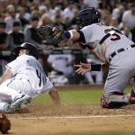 Arizona Diamondbacks Paul Goldschmidt slides under the tag of Detroit Tigers catcher James McCann to score on base hit by Yasmany Tomas during the third inning of a baseball game against the Detroit Tigers, Tuesday, May 9, 2017, in Phoenix. (AP Photo/Matt York)