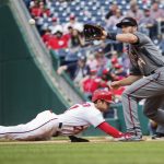 Arizona Diamondbacks first baseman Paul Goldschmidt (44) reaches for the throw as Washington Nationals Trea Turner (7)  dives back to first base during the eighth inning of a baseball game in Washington, Thursday, May 4, 2017. The Nationals won 4-2. (AP Photo/Manuel Balce Ceneta)
