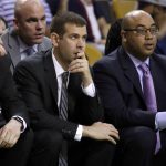 Boston Celtics head coach Brad Stevens, center, watches with assistants Jay Larranaga, left, and Micah Shrewsberry during the second half of Game 2 of the NBA basketball Eastern Conference finals against the Cleveland Cavaliers, Friday, May 19, 2017, in Boston. (AP Photo/Elise Amendola)