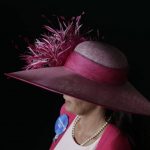 A woman wears a fancy hat before the 143rd running of the Kentucky Derby horse race at Churchill Downs Saturday, May 6, 2017, in Louisville, Ky. (AP Photo/Matt Slocum)