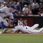 Arizona Diamondbacks Jeff Mathis is tagged out stealing at third by New York Mets T.J. Rivera during the seventh inning of a baseball game, Monday, May 15, 2017, in Phoenix. (AP Photo/Matt York)