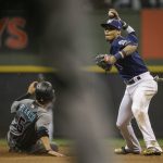 Arizona Diamondbacks' Gregor Blanco is forced out at second by Milwaukee Brewers' Jonathan Villar during the fifth inning of a baseball game Thursday, May 25, 2017, in Milwaukee. (AP Photo/Tom Lynn)