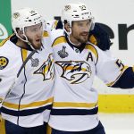 Nashville Predators' Colton Sissons, left, celebrates his goal against the Pittsburgh Penguins with Roman Josi during the third period in Game 1 of the NHL hockey Stanley Cup Finals, Monday, May 29, 2017, in Pittsburgh. (AP Photo/Gene J. Puskar)