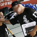 Chicago White Sox manager Rick Renteria (17) talks with Avisail Garcia, left, in the dugout after a baseball game against the Arizona Diamondbacks Wednesday, May 24, 2017, in Phoenix. The Diamondbacks defeated the White Sox 8-6. (AP Photo/Ross D. Franklin)