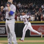 Arizona Diamondbacks' Jake Lamb (22) rounds the bases after hitting a solo home run against the New York Mets during the sixth inning of a baseball game, Monday, May 15, 2017, in Phoenix. (AP Photo/Matt York)