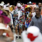 Fans arrive for the 143rd running of the Kentucky Derby horse race at Churchill Downs Saturday, May 6, 2017, in Louisville, Ky. (AP Photo/John Minchillo)