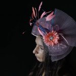 A woman wears a fancy hat before the 143rd running of the Kentucky Derby horse race at Churchill Downs Saturday, May 6, 2017, in Louisville, Ky. (AP Photo/Matt Slocum)