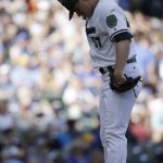 Milwaukee Brewers starting pitcher Chase Anderson prepares to throw to the Arizona Diamondbacks during the sixth inning of a baseball game Saturday, May 27, 2017, in Milwaukee. (AP Photo/Jeffrey Phelps)