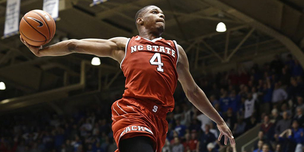 FILE - In this Jan. 23, 2017 file photo, North Carolina State's Dennis Smith Jr. (4) drives to the ...
