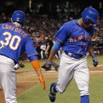 New York Mets' Curtis Granderson (3) celebrates his home run against the Arizona Diamondbacks with Michael Conforto (30) during the fifth inning of a baseball game, Tuesday, May 16, 2017, in Phoenix. (AP Photo/Ross D. Franklin)