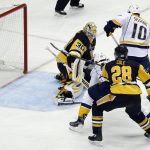 Nashville Predators' Colton Sissons (10) scores a goal past Pittsburgh Penguins' goalie Matt Murray (30) during the third period in Game 1 of the NHL hockey Stanley Cup Finals, Monday, May 29, 2017, in Pittsburgh. (AP Photo/Gene J. Puskar)