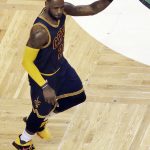 Cleveland Cavaliers forward LeBron James signals as he runs upcourt during first half of Game 2 of the NBA basketball Eastern Conference finals against the Boston Celtics, Friday, May 19, 2017, in Boston. (AP Photo/Elise Amendola)