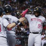 Pittsburgh Pirates' Josh Bell (55) celebrates his two-run home run against the Arizona Diamondbacks with Francisco Cervelli (29) and Gregory Polanco during the third inning of a baseball game Sunday, May 14, 2017, in Phoenix. (AP Photo/Ross D. Franklin)
