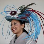 A woman wears a fancy hat before the 143rd running of the Kentucky Derby horse race at Churchill Downs Saturday, May 6, 2017, in Louisville, Ky. (AP Photo/John Minchillo)