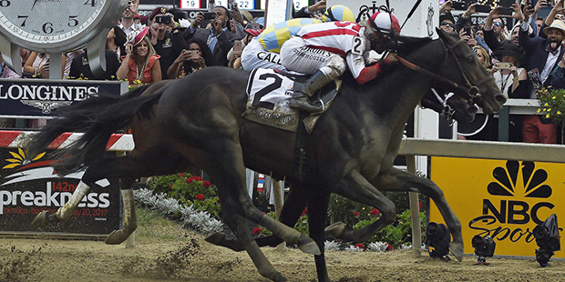 Cloud Computing (2), ridden by Javier Castellano, wins the 142nd Preakness Stakes horse race ahead ...