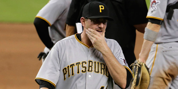 Pittsburgh Pirates relief pitcher Daniel Hudson (41) walks from the mound as he is relieved during ...