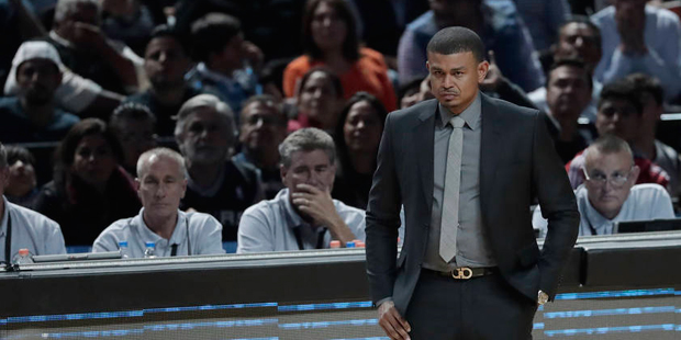 Phoenix Suns head coach Earl Watson observes from he sidelines as his team plays the San Antonio Sp...
