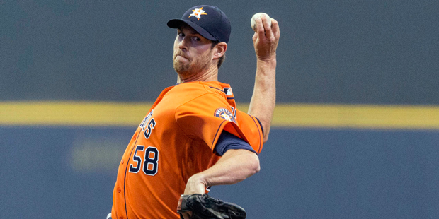Houston Astros' Doug Fister pitches to a Milwaukee Brewers batter during the first inning of a base...