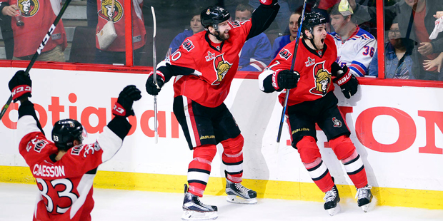 Ottawa Senators' Kyle Turris (7) celebrates after he scored the game-winning goal during overtime a...