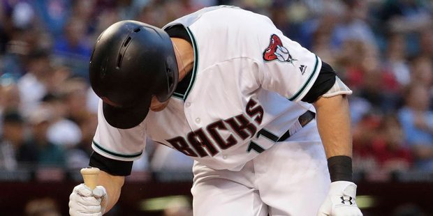 Arizona Diamondbacks A.J. Pollock reacts to striking out against the Detroit Tigers during the firs...