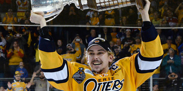 Erie Otters center Dylan Strome carries the J. Ross Robertson Cup after the Otters won the OHL cham...