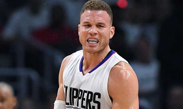 Los Angeles Clippers forward Blake Griffin reacts after scoring during the first half in Game 1 of ...