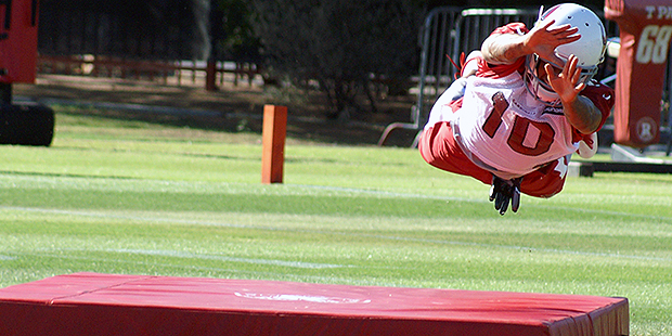 Cardinals receiver Brittan Golden leaps during a drill in an OTA practice May 24. (Photo by Adam Gr...