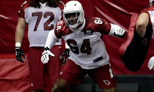 Arizona Cardinals fourth-round draft pick Dorian Johnson (64) works out during an NFL football rook...