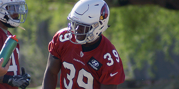 Cardinals DB Elie Bouka takes a break during an OTA practice May 24. (Photo by Adam Green/Arizona S...