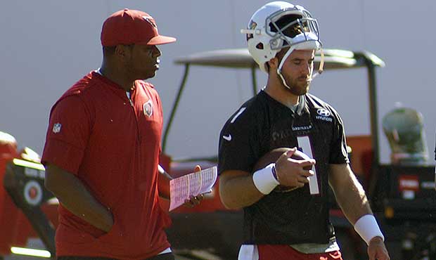 QB Trevor Knight and QB coach Byron Leftwich chat during an OTA practice May 24. (Photo by Adam Gre...