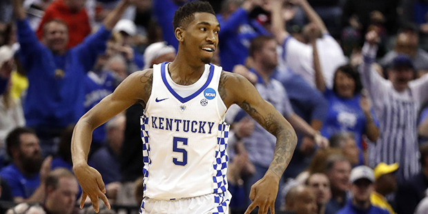 Kentucky's Malik Monk celebrates after making a 3-point basket during the second half of a second-r...
