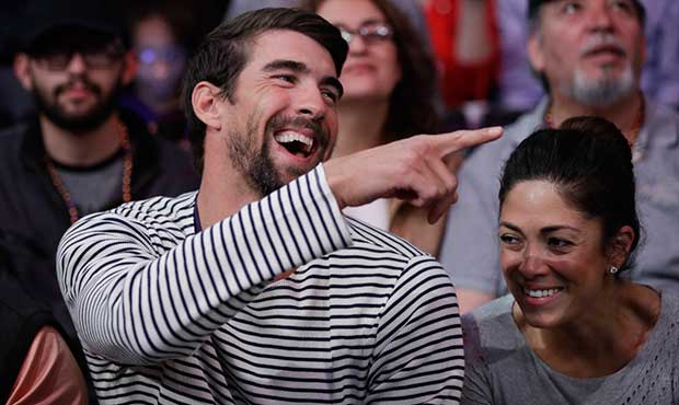 An AP photo of Michael Phelps, hopefully (for his sake) not pointing and laughing at his future sha...