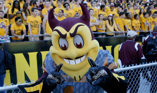 Arizona State mascot "Sparky" points during the first half of an NCAA college football game against...