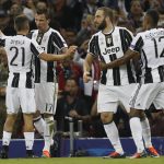 Juventus' Mario Mandzukic, second from left, celebrates with teammates Paulo Dybala Miralem Pjanic, Gonzalo Higuain and Alex Sandro after scoring scores during the Champions League final soccer match between Juventus and Real Madrid at the Millennium Stadium in Cardiff, Wales, Saturday June 3, 2017. (AP Photo/Kirsty Wigglesworth)