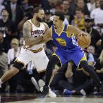 Cleveland Cavaliers guard Deron Williams (31) defends Golden State Warriors guard Shaun Livingston (34) during the first half of Game 4 of basketball's NBA Finals in Cleveland, Friday, June 9, 2017. (AP Photo/Tony Dejak)