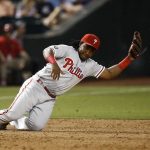 Philadelphia Phillies' Maikel Franco is unable to make a play on a ground ball hit by Arizona Diamondbacks' Brandon Drury during the fifth inning of a baseball game Friday, June 23, 2017, in Phoenix. Drury got a single on the play. (AP Photo/Ross D. Franklin)