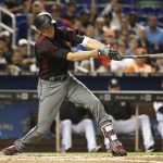 Arizona Diamondbacks' Nick Ahmed hits a triple during the fourth inning of the team's baseball game against the Miami Marlins, Thursday, June 1, 2017, in Miami. (AP Photo/Lynne Sladky)