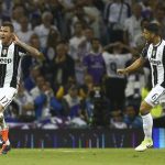 Juventus' Mario Mandzukic, left, celebrates after scoring during the Champions League final soccer match between Juventus and Real Madrid at the Millennium stadium in Cardiff, Wales Saturday June 3, 2017. (AP Photo/Dave Thompson)