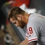 Philadelphia Phillies' Ben Lively sits in the dugout after being pulled from the baseball game during the sixth inning against the Arizona Diamondbacks on Saturday, June 24, 2017, in Phoenix. (AP Photo/Ross D. Franklin)